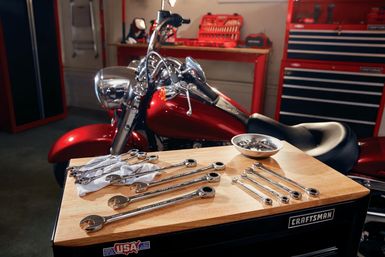 11 piece metric ratcheting combination wrench set at a workshop.