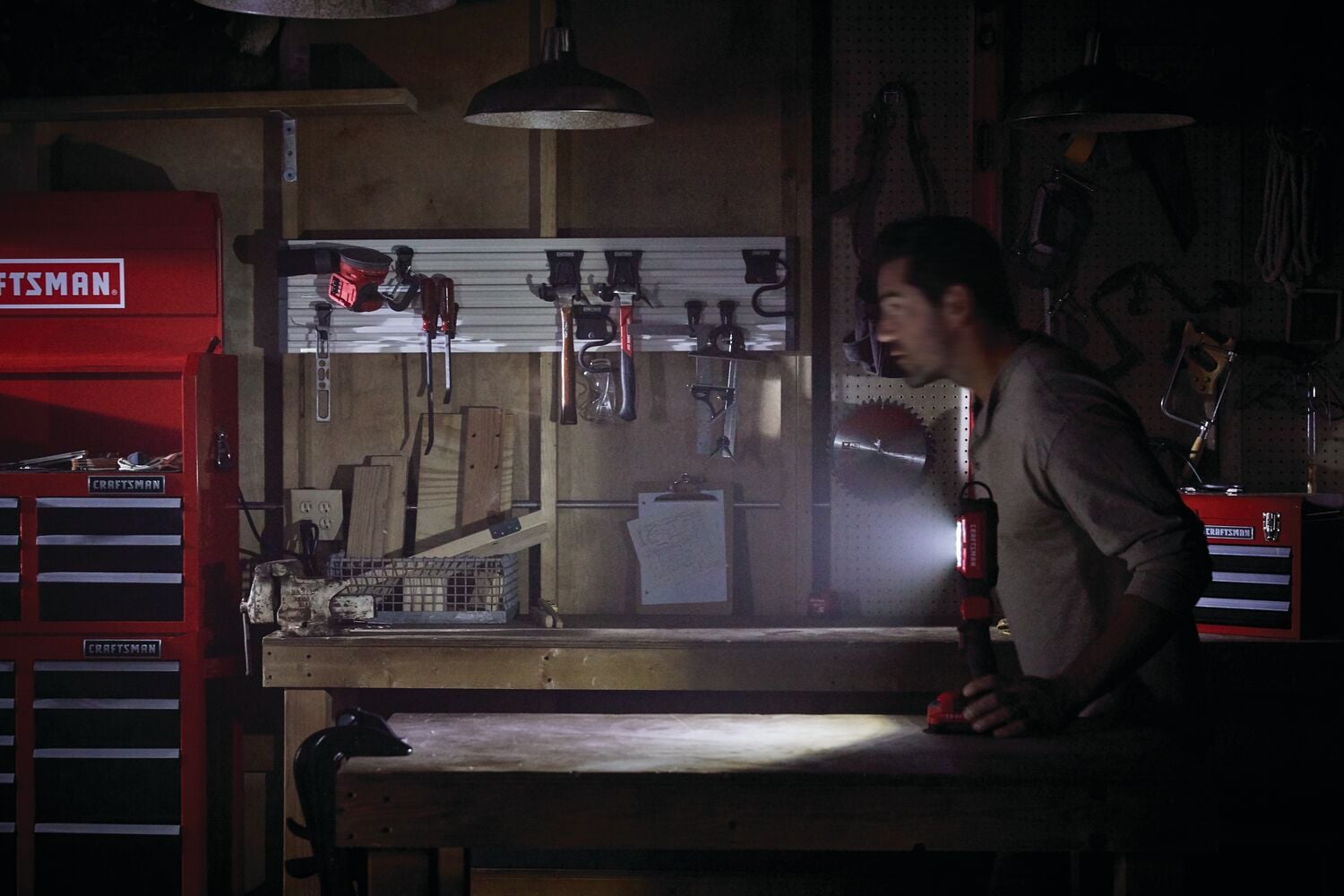 Cordless led hanging work light tool only being used to light the workshop.