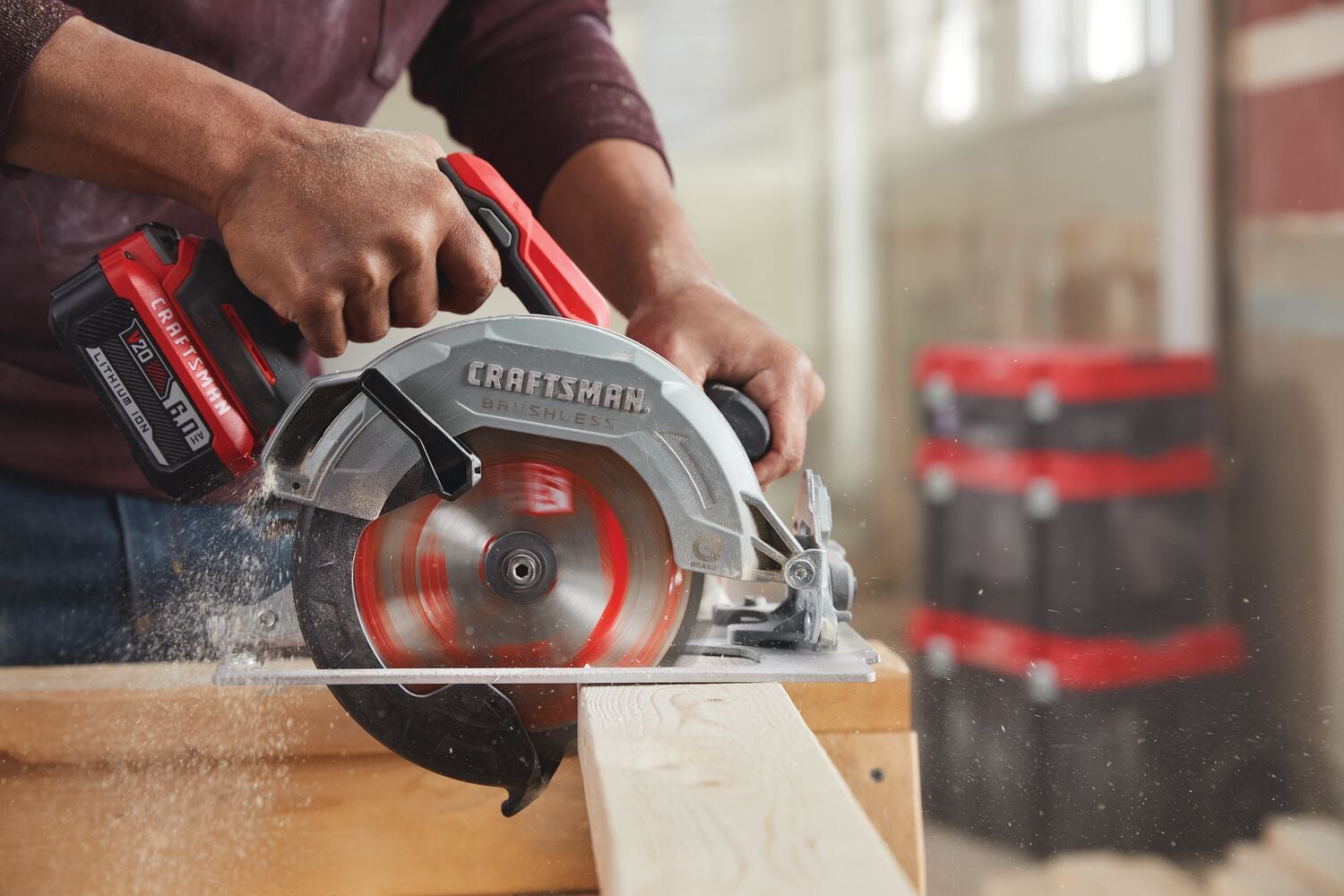 Photo of a Craftsman cordless circular saw, SKU CMCS550B, cutting a wooden board during use.