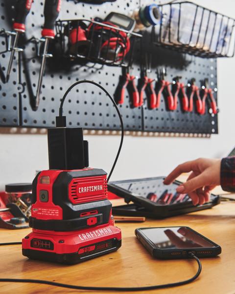 Misting fan base charger feature on workbench