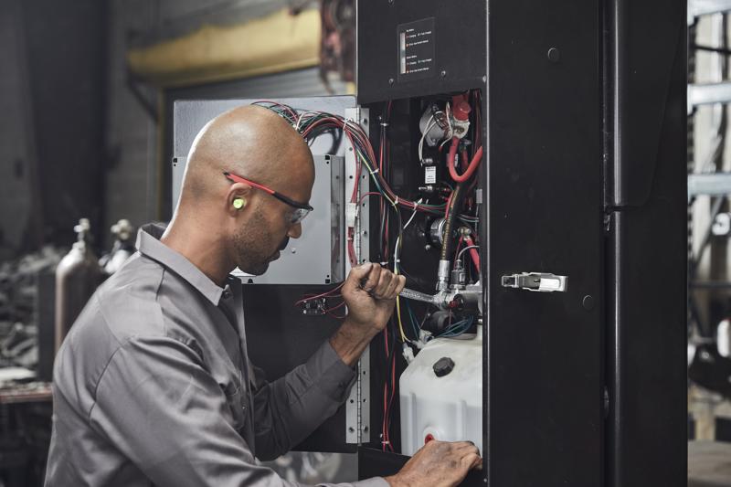 V series S A E combination wrench set (12 piece) being used by a person.