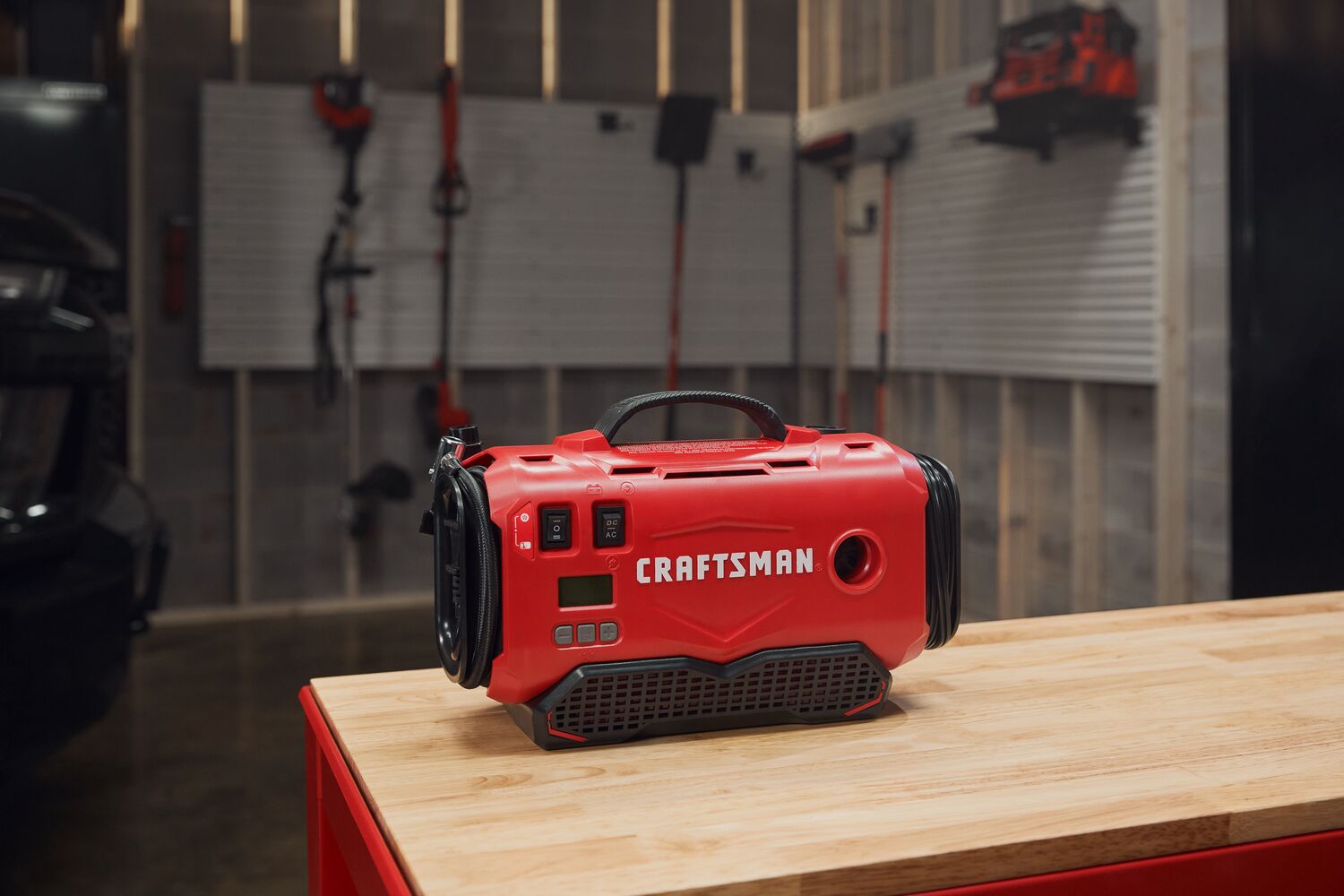 CRAFTSMAN V20* Inflator sittong on work bench
