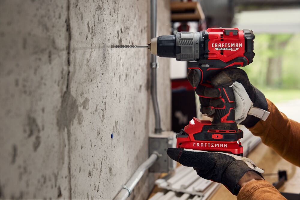 CRAFTSMAN V20* RP HammerDrill mounting Versatrack into concrete garage wall