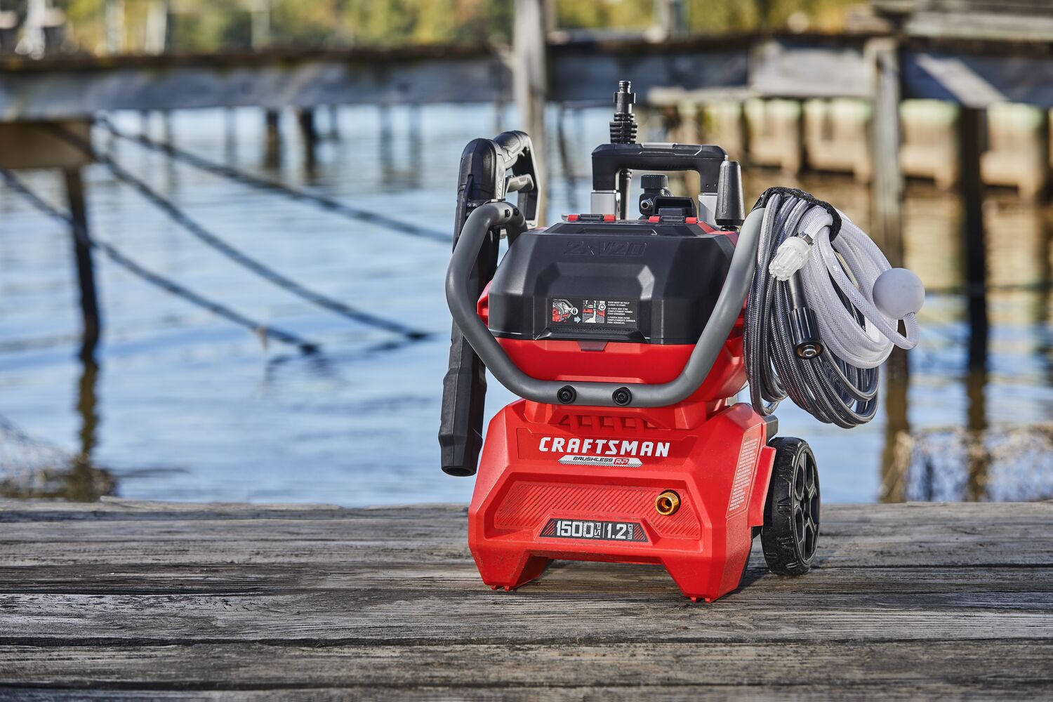 CRAFTSMAN 1500 PSI Pressure Washer sitting on pier with no person and water in background